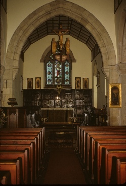 The aisle and altar in Chollerton church.