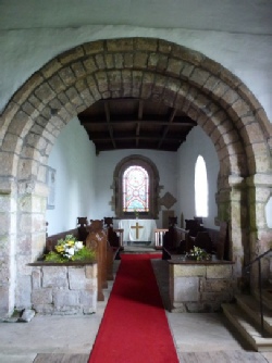 Archway to the altar in Edlingham Church. 