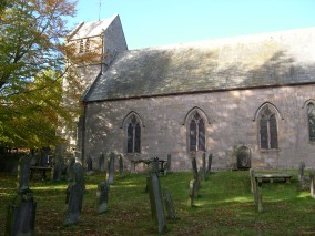 The church and churchyard in Chatton.