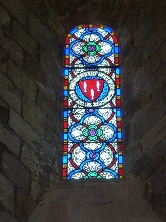 Stained glass window in Norham