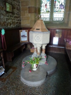 The font in Falstone Church. 