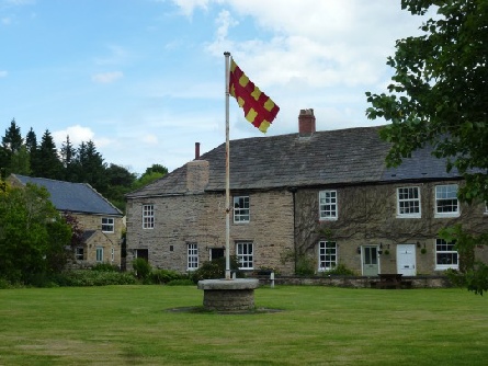 The Northumbrian flag flying in Melkridge.