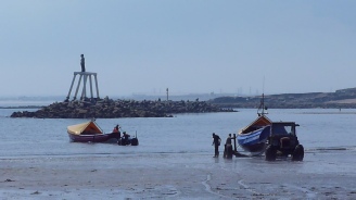 Boats near the shore in Newbiggin.